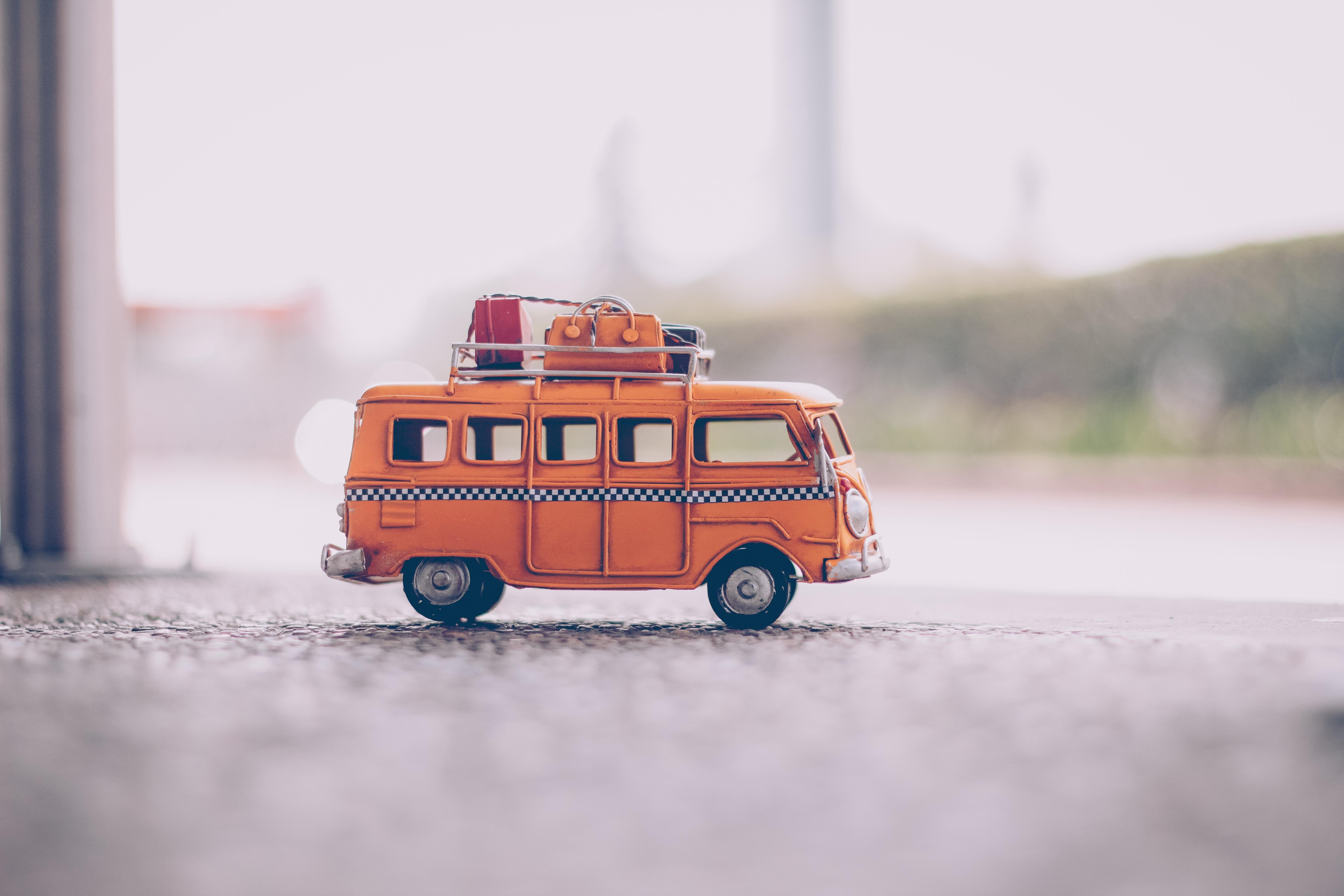A brown colour toy bus